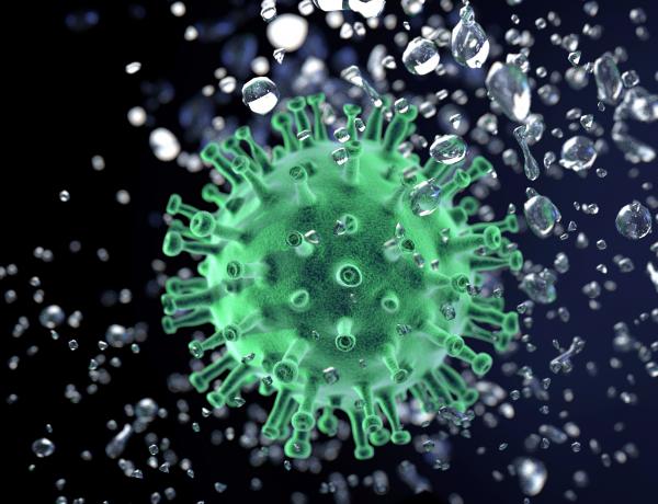 Grönt coronavirus omgivet av aerosoldroppar